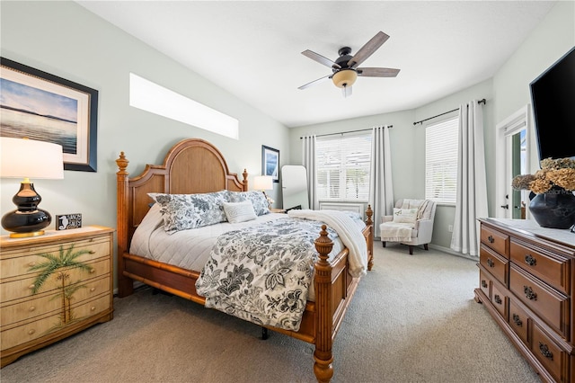 6750 64th Ter E, Bradenton, FL 34203 - bedroom with light colored carpet and a ceiling fan