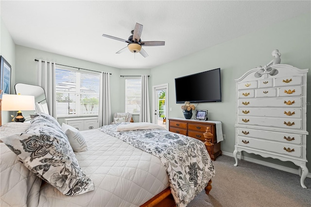 6750 64th Ter E, Bradenton, FL 34203 - bedroom featuring light carpet and ceiling fan
