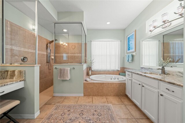6750 64th Ter E, Bradenton, FL 34203 - full bath featuring a bath, vanity, tile patterned floors, walk in shower, and recessed lighting