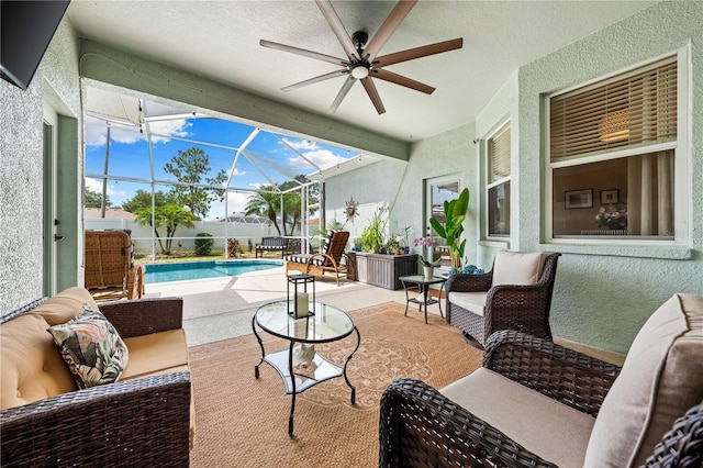 6750 64th Ter E, Bradenton, FL 34203 - view of patio featuring an outdoor living space, ceiling fan, and a lanai