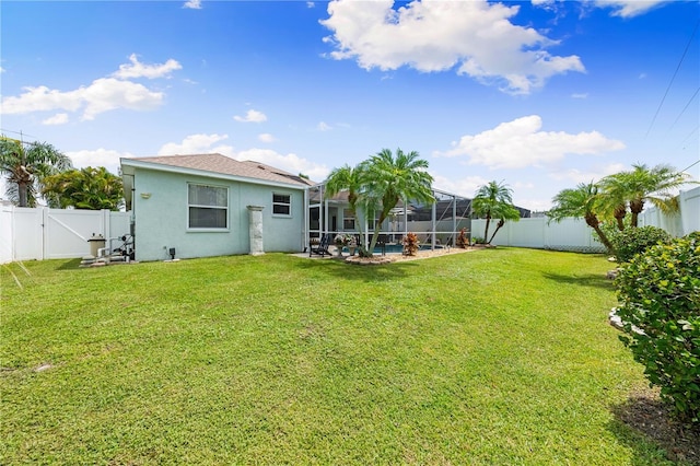 6750 64th Ter E, Bradenton, FL 34203 - fenced backyard with a lanai