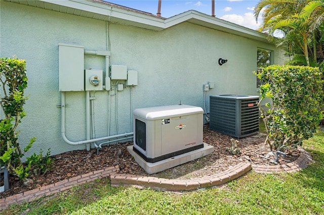 6750 64th Ter E, Bradenton, FL 34203 - exterior view of a central air condition unit and stucco siding