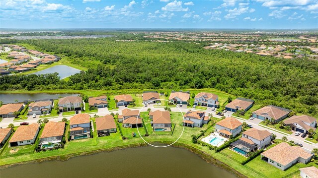 3504 Big Sky Way, Bradenton, FL 34211 - aerial view of residential area with a large body of water and a forest