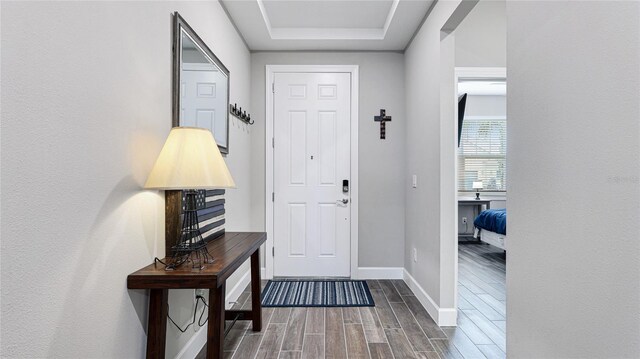 3504 Big Sky Way, Bradenton, FL 34211 - foyer with wood finished floors, baseboards, and a raised ceiling