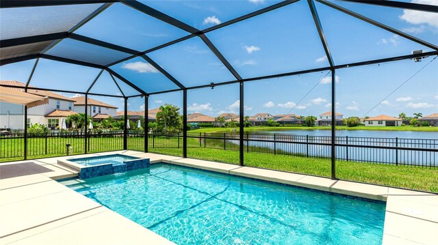 3504 Big Sky Way, Bradenton, FL 34211 - view of swimming pool with a residential view, a water view, a pool with connected hot tub, a lanai, and a patio