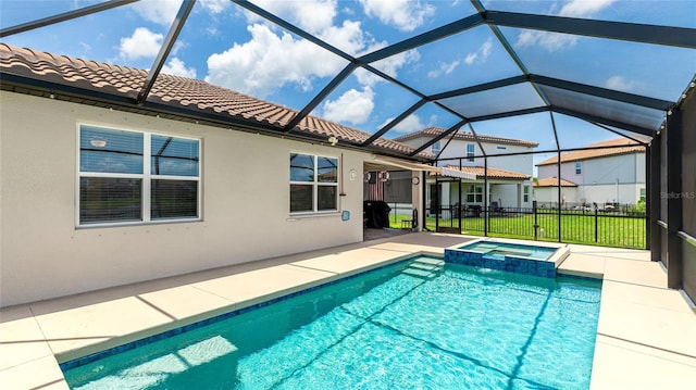 3504 Big Sky Way, Bradenton, FL 34211 - view of swimming pool featuring a patio, a pool with connected hot tub, and glass enclosure