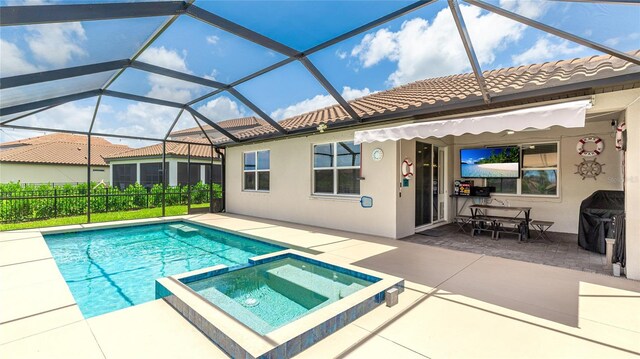 3504 Big Sky Way, Bradenton, FL 34211 - view of pool with a patio, a pool with connected hot tub, and a grill