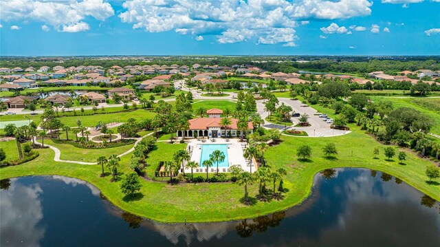 3504 Big Sky Way, Bradenton, FL 34211 - aerial perspective of suburban area featuring a pool and a nearby body of water