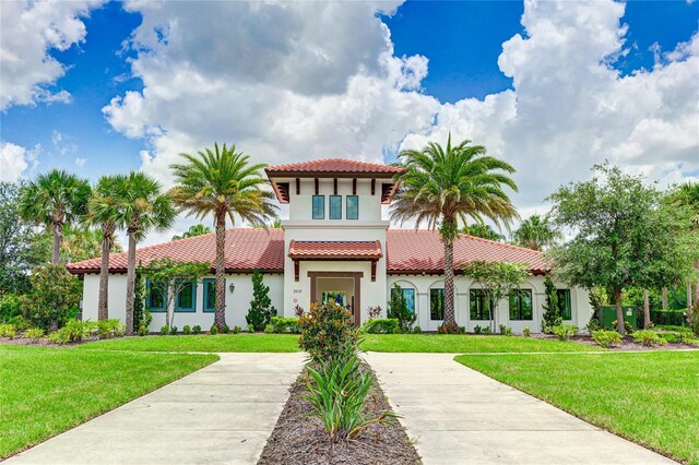 3504 Big Sky Way, Bradenton, FL 34211 - mediterranean / spanish-style home featuring a tile roof, stucco siding, and a front yard