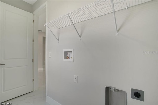 2906 18th St SW, Lehigh Acres, FL 33976 - laundry room featuring hookup for an electric dryer, hookup for a washing machine, marble finish floors, and baseboards