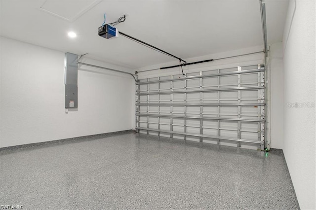 2906 18th St SW, Lehigh Acres, FL 33976 - garage with electric panel and a garage door opener