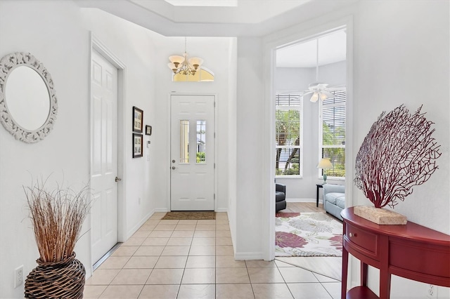 2085 Mattamy Ct, Venice, FL 34292 - foyer with a chandelier and light tile patterned floors