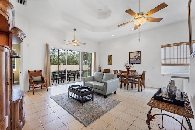 2085 Mattamy Ct, Venice, FL 34292 - living area with ceiling fan, light tile patterned flooring, recessed lighting, and a raised ceiling