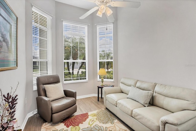 2085 Mattamy Ct, Venice, FL 34292 - living room featuring light wood finished floors and ceiling fan