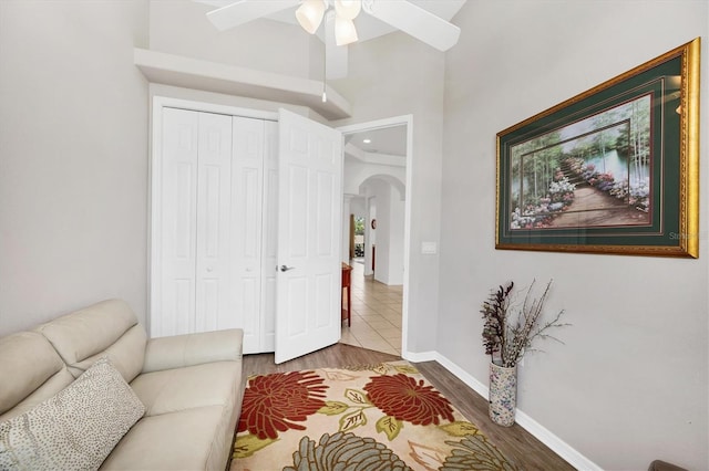 2085 Mattamy Ct, Venice, FL 34292 - living area featuring arched walkways, ceiling fan, wood finished floors, and recessed lighting