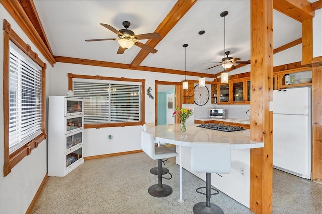 4528 58th St W, Bradenton, FL 34210 - kitchen featuring freestanding refrigerator, ceiling fan, light countertops, baseboards, and beam ceiling