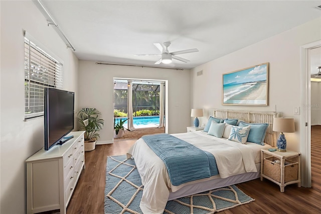 2515 Huntington Ave, Sarasota, FL 34232 - bedroom with access to exterior, dark wood finished floors, and a ceiling fan