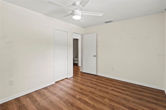 2515 Huntington Ave, Sarasota, FL 34232 - empty room featuring wood finished floors, baseboards, and a ceiling fan