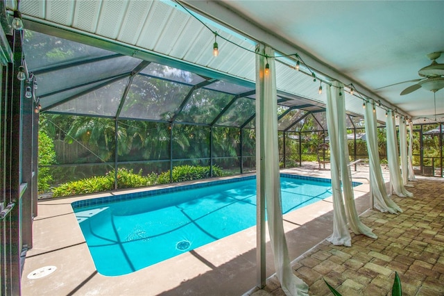 2515 Huntington Ave, Sarasota, FL 34232 - swimming pool with a ceiling fan, a patio area, and a lanai