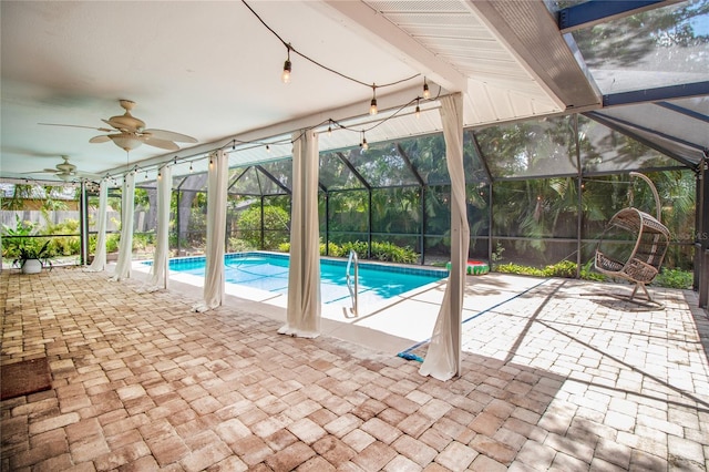 2515 Huntington Ave, Sarasota, FL 34232 - swimming pool with glass enclosure, a patio area, and a ceiling fan