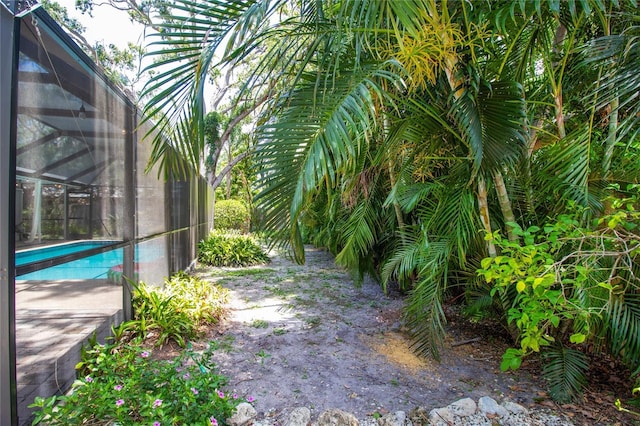 2515 Huntington Ave, Sarasota, FL 34232 - view of yard with an outdoor pool and a lanai