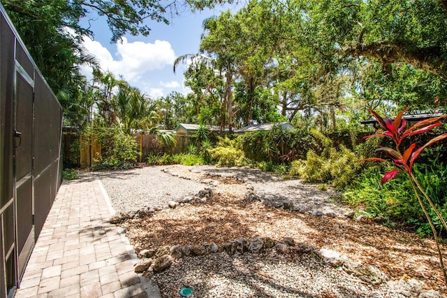 2515 Huntington Ave, Sarasota, FL 34232 - fenced backyard featuring a patio