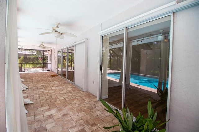 2515 Huntington Ave, Sarasota, FL 34232 - unfurnished sunroom with a ceiling fan and a pool