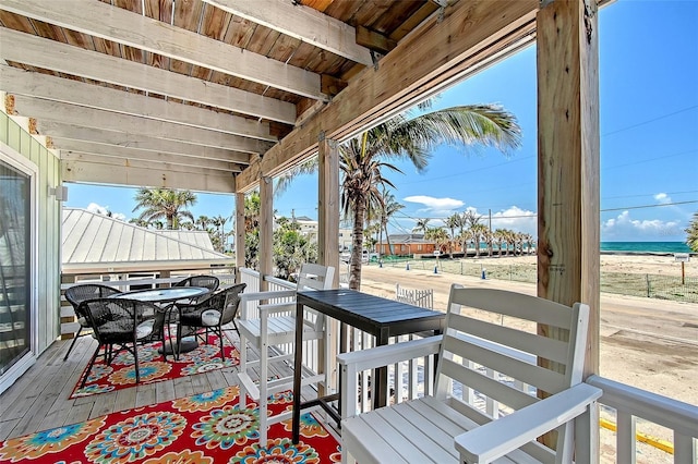 1103 Shore View Dr, Englewood, FL 34223 - wooden terrace featuring outdoor dining area