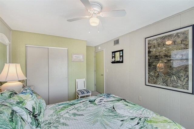 1103 Shore View Dr, Englewood, FL 34223 - bedroom with a closet and a ceiling fan