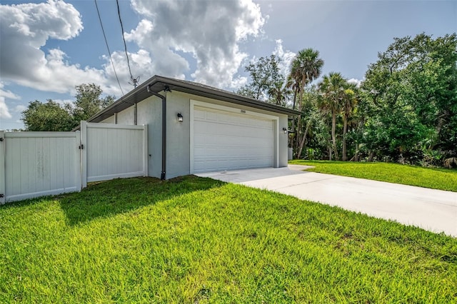 2546 Malibu Ln, North Port, FL 34286 - garage with a gate and driveway