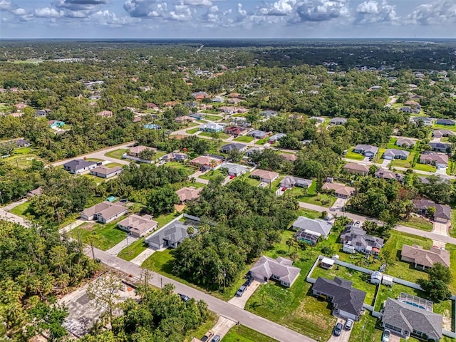 2546 Malibu Ln, North Port, FL 34286 - aerial view of property and surrounding area with nearby suburban area