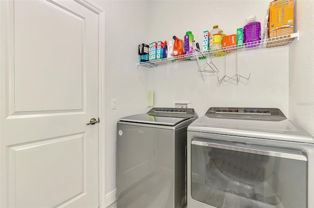 2546 Malibu Ln, North Port, FL 34286 - laundry room featuring separate washer and dryer