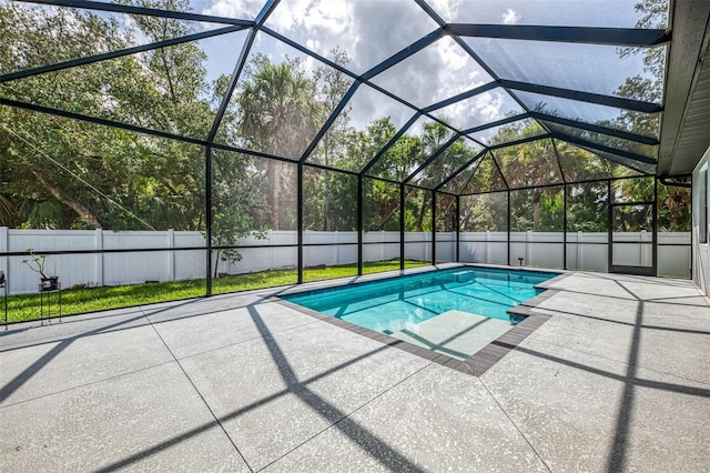 2546 Malibu Ln, North Port, FL 34286 - view of pool featuring a patio area, a fenced backyard, and glass enclosure