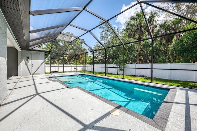 2546 Malibu Ln, North Port, FL 34286 - view of swimming pool featuring a patio area, a fenced backyard, and a lanai
