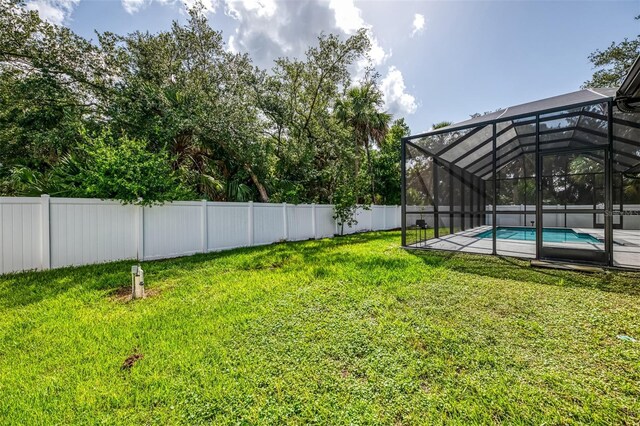 2546 Malibu Ln, North Port, FL 34286 - view of yard featuring glass enclosure