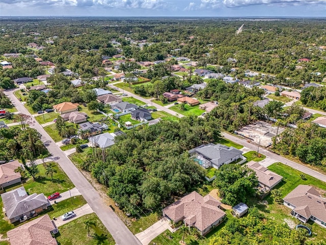 2546 Malibu Ln, North Port, FL 34286 - aerial view of property and surrounding area featuring nearby suburban area