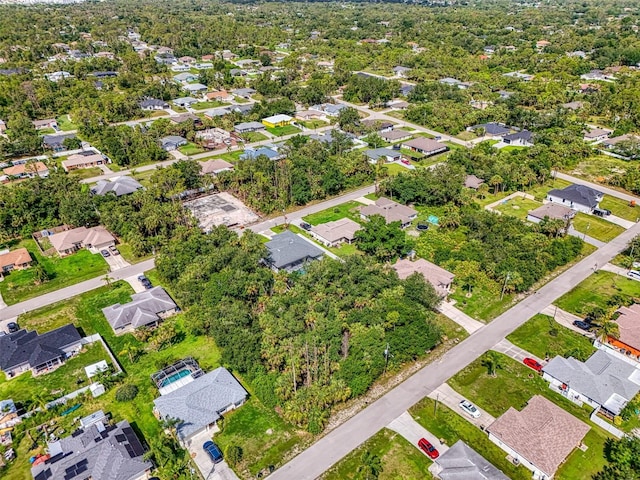 2546 Malibu Ln, North Port, FL 34286 - aerial view of property and surrounding area featuring nearby suburban area