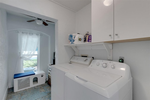 4120 51st Dr W, Bradenton, FL 34210 - laundry room featuring washing machine and clothes dryer, a ceiling fan, cabinet space, and stone finish floors