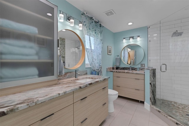 4120 51st Dr W, Bradenton, FL 34210 - full bathroom featuring a shower stall, vanity, and tile patterned flooring