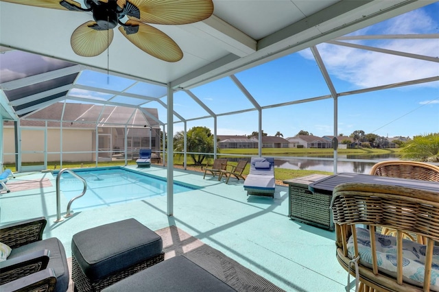 4120 51st Dr W, Bradenton, FL 34210 - outdoor pool featuring a patio area, a water view, a lanai, ceiling fan, and a residential view