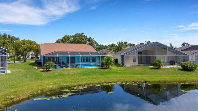 4120 51st Dr W, Bradenton, FL 34210 - back of property with a lanai, a yard, an outdoor pool, and a water view