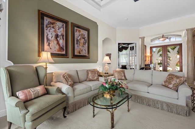 7513 Coventry Ct, Lakewood Ranch, FL 34202 - carpeted living area with ornate columns and ornamental molding