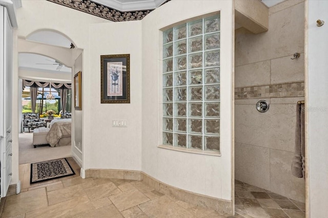 7513 Coventry Ct, Lakewood Ranch, FL 34202 - full bathroom with ensuite bathroom, walk in shower, stone tile flooring, and baseboards