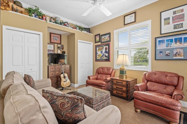 7513 Coventry Ct, Lakewood Ranch, FL 34202 - living room with ceiling fan, baseboards, and ornamental molding