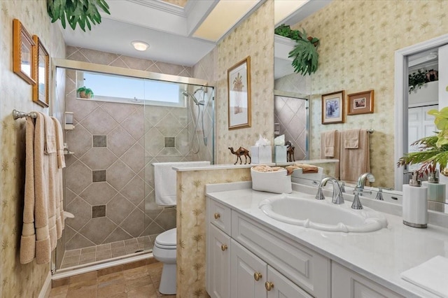 7513 Coventry Ct, Lakewood Ranch, FL 34202 - bathroom with vanity, toilet, wallpapered walls, and a stall shower