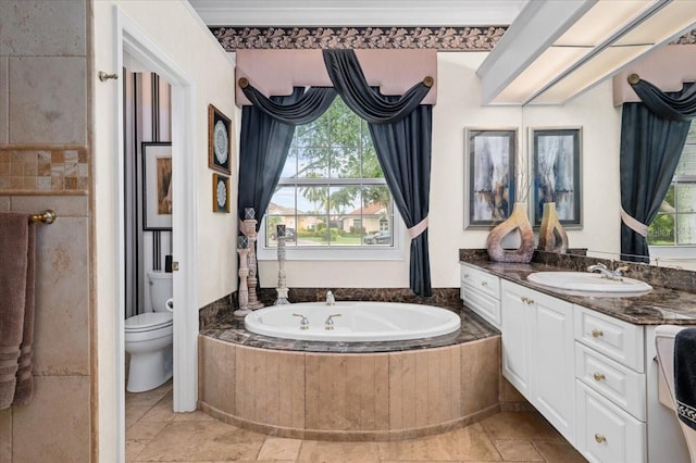 7513 Coventry Ct, Lakewood Ranch, FL 34202 - full bath featuring a bath, toilet, plenty of natural light, and vanity