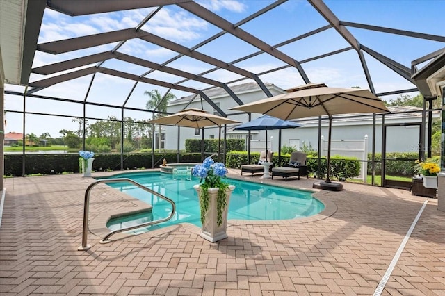 7513 Coventry Ct, Lakewood Ranch, FL 34202 - view of pool with a patio, a pool with connected hot tub, and glass enclosure