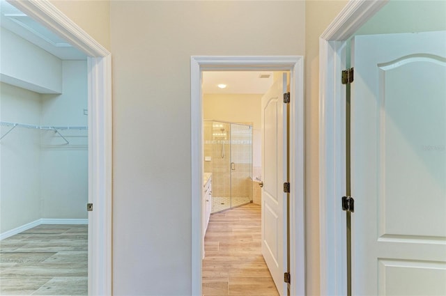 8772 Stone Harbour Loop, Bradenton, FL 34212 - corridor with light wood-style flooring
