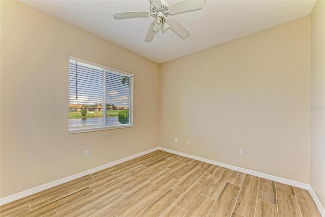 8772 Stone Harbour Loop, Bradenton, FL 34212 - spare room with wood tiled floors and ceiling fan