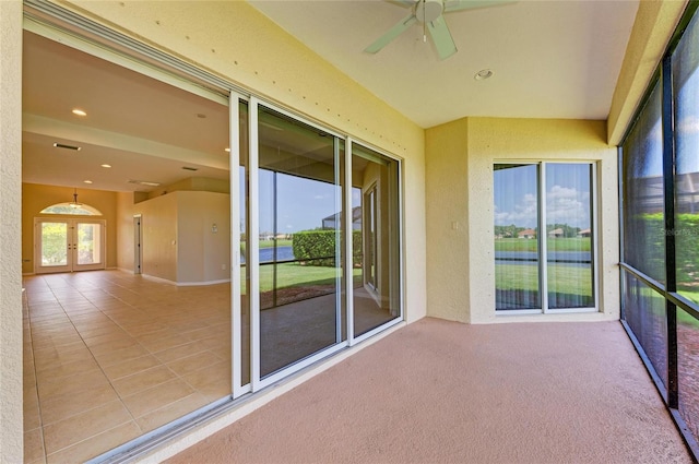 8772 Stone Harbour Loop, Bradenton, FL 34212 - unfurnished sunroom featuring recessed lighting and french doors